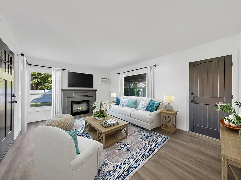Electric fireplace & wall-mounted air conditioning.