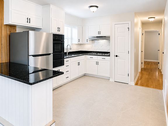 Open kitchen with bar seating_perfect for casual dining and entertaining.