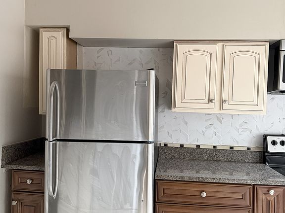 Kitchen with new cabinets and granite countertop