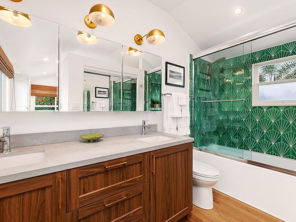 beautiful bathroom dual sinks behind is master closet