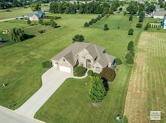 Located on a premium, fully landscaped .90 acre parcel!