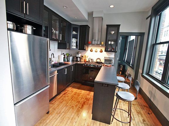 kitchen with island for eating and prep