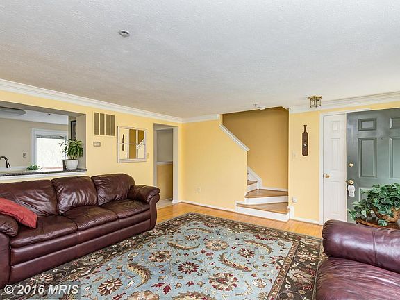 Living room opening allows cook in the kitchen