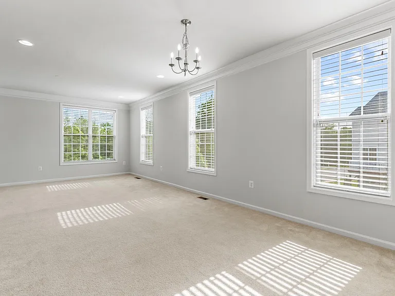 Living & Dining Combo with a wall of windows bringing Natural light all day!