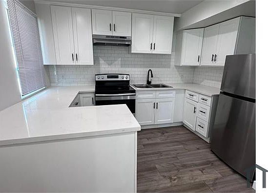 4th image of 6050 1/2 10th Ave