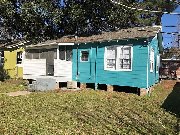 Rear of house with rear screened porch