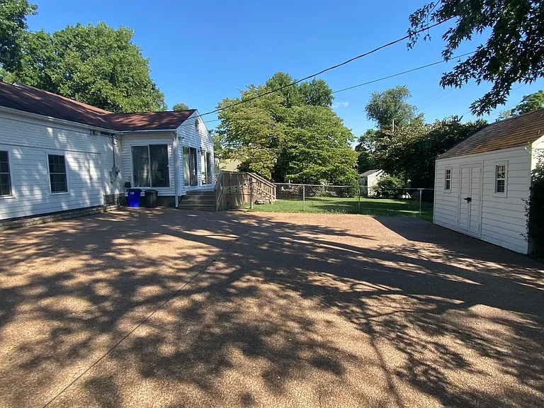 Large parking area at back of house