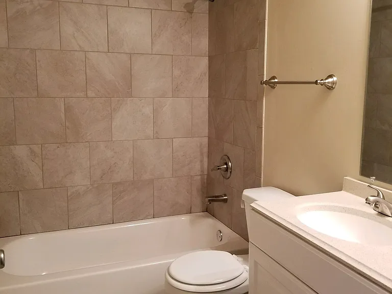 Cutom Bathroom with Marble Tile Surrount and solid surface vanity Cutom Bathroom with Marble Tile Surrount and solid surface vanity