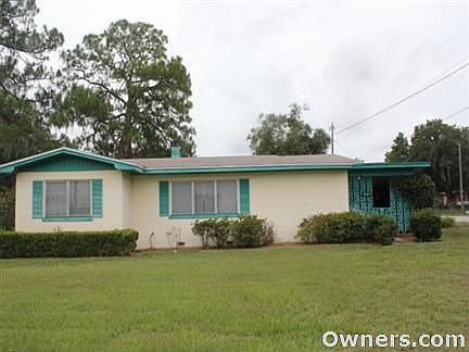 SIDE PATIO W/CARPORT & WORKSHOP IN REAR