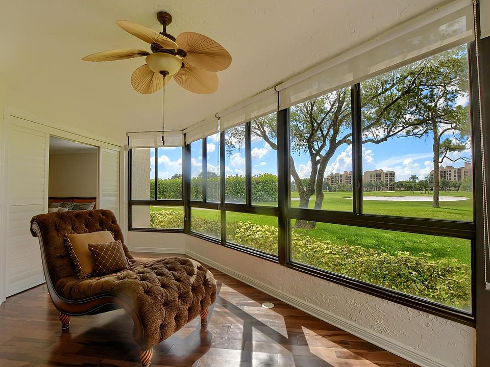 Enclosed balcony overlooking golf course