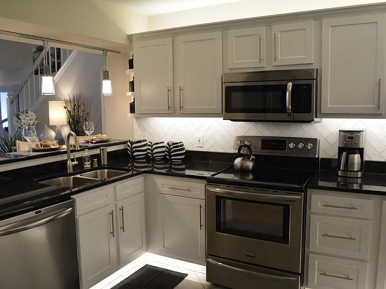 Select units have backsplashes and under cabinet & over cabinet lighting