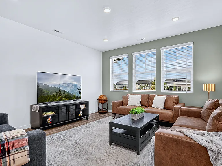 Open Living Room with 65" Smart TV & Seating for 8