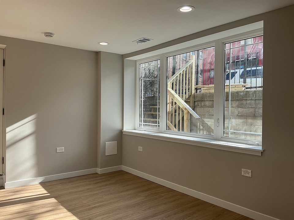 Front entryway and garden space seen through front window