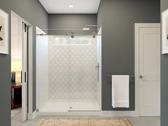 Primary bath with glass shower enclosure