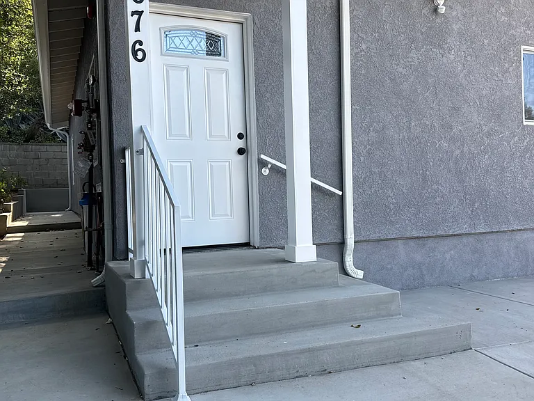 Front. Wrap around walkway and space for outside side areas.
