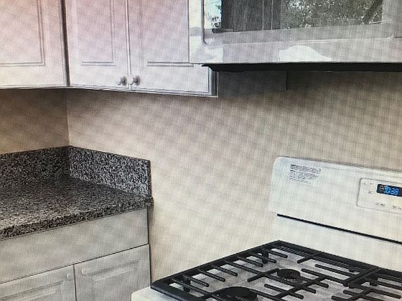 NEW STOVE AND MICROWAVE