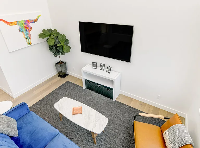 Looking down to Living Room from stair landing