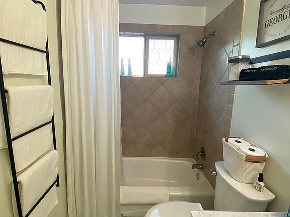 new toilet, marble top vanity (new plumbing).