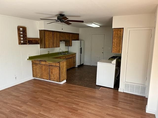 Living room and kitchen, as seen from front entry