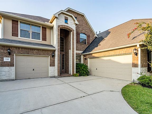 Your guests will appreciate thecovered brick front porch.