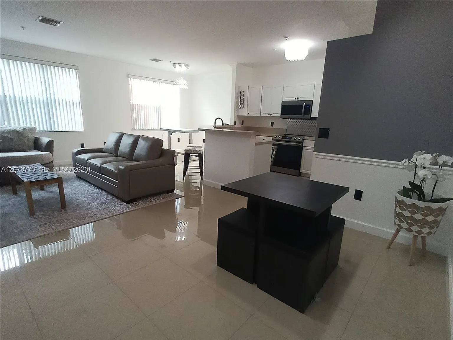 El-Ad Villaggio Condo Bld — Photo 1