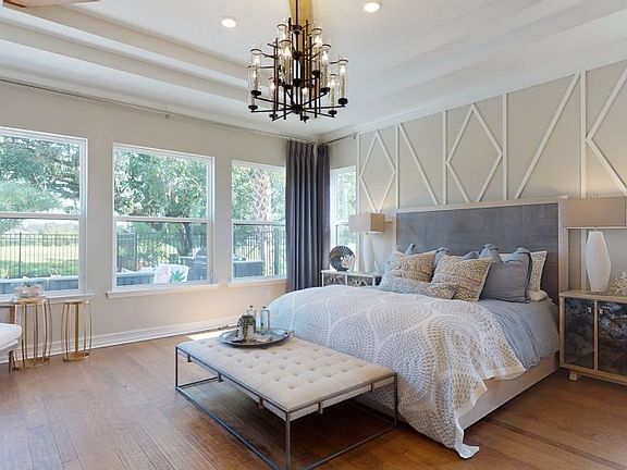 Tucked in the back of the home for added privacy, the expansive owner s suite includes a private bat