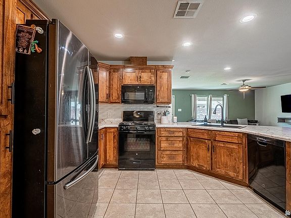 3rd image of 10213 E 34th Pl