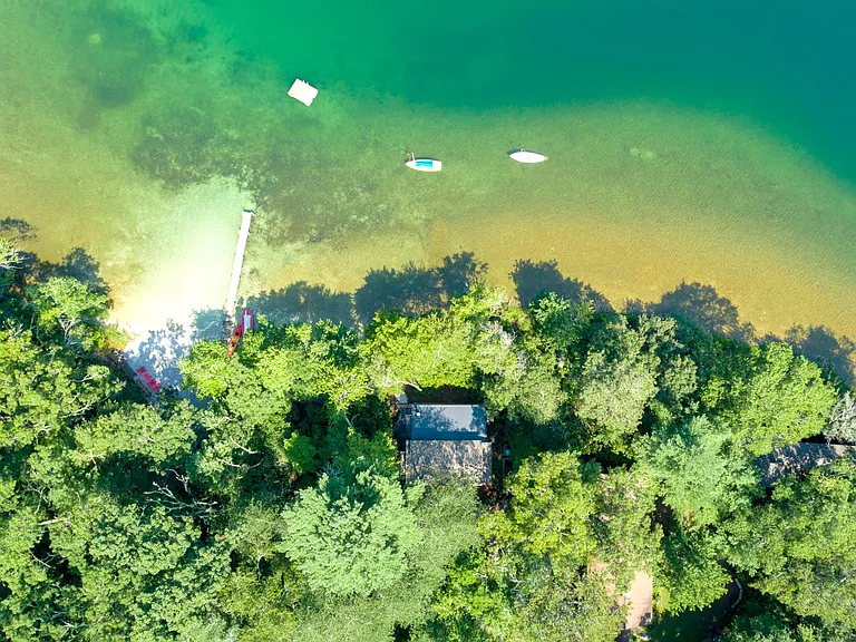bird's eye view of cottage on shore of Long Pond