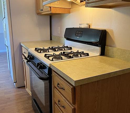 Stove and Refrigerator also in the Kitchen