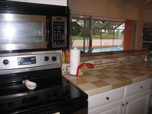 In kitchen w/ view of pool