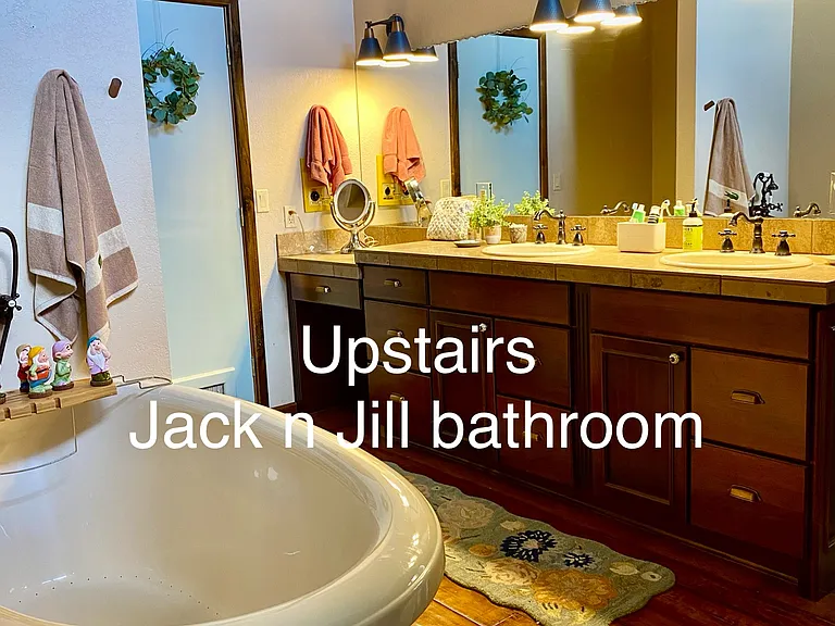 Spruce & Pine Cabin
Upstairs jack n jill bathroom, shared between the primary and the bunk room
Separate shower, soaking tub, sauna (not for use), double sinks