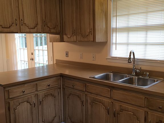 Tons of cabinets in kitchen