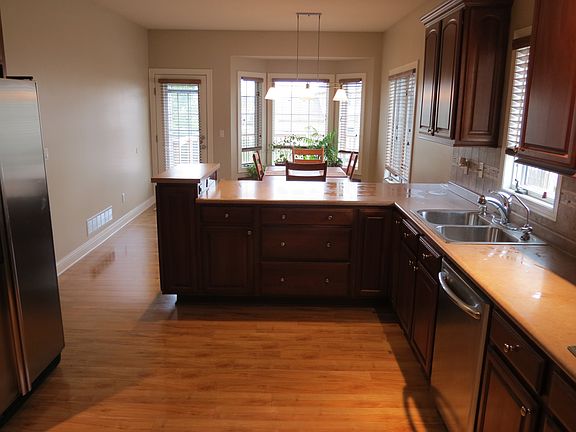 Kitchen with cherry cabinets