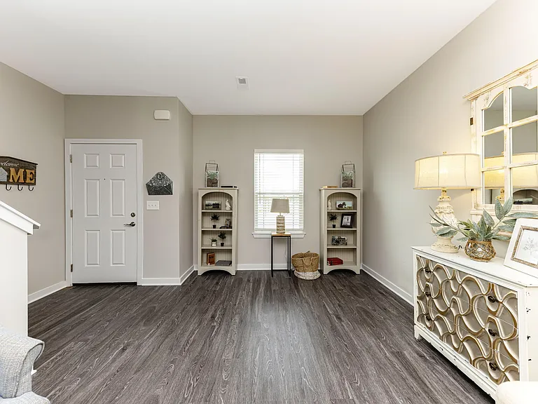 Spacious living room with hardwood-style flooring