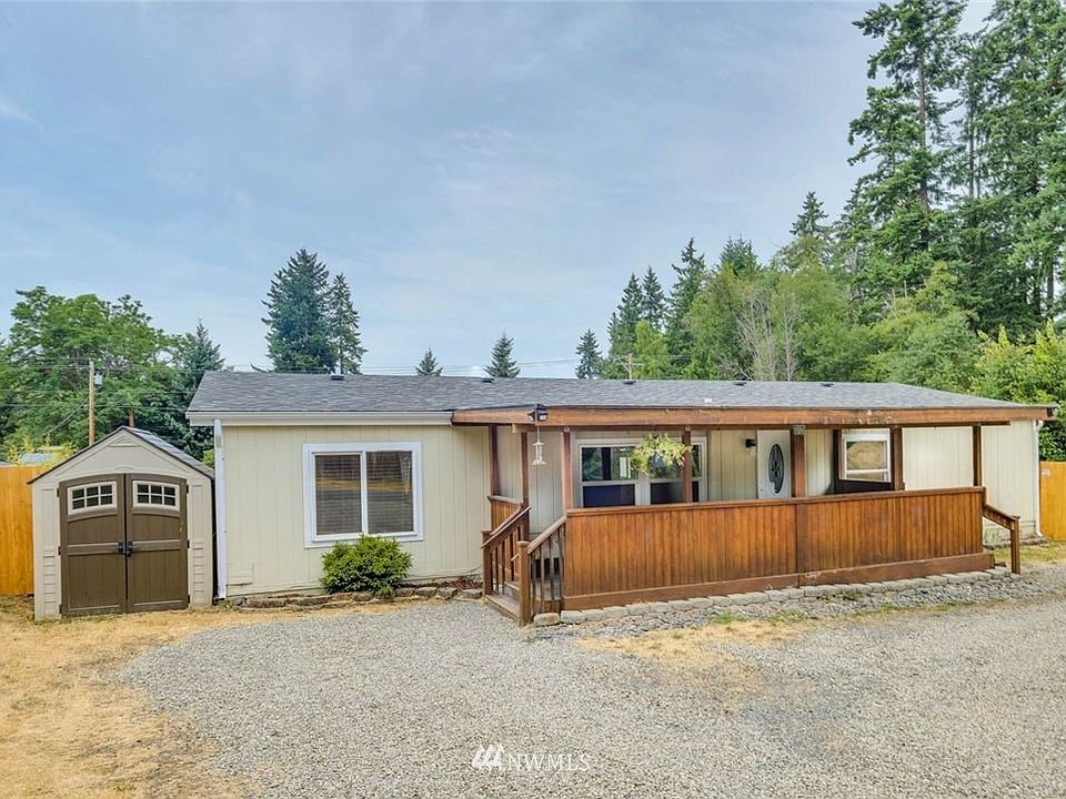 Home sits on a corner lot new gravel on the driveway