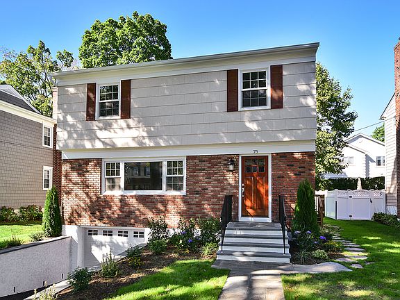 New windows, new front walk, new landscaping, new underground 4 Zone lawn sprinkler system and newly painted . . .