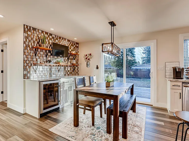Bar Area with wine cooler and a 32" Smart TV to watch sports