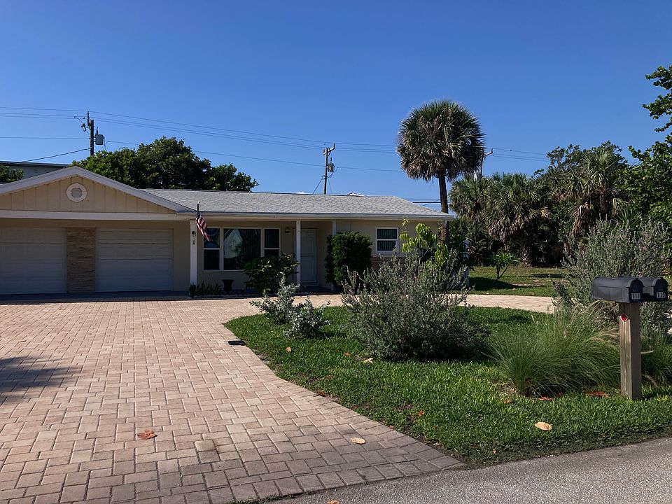 On car garage, semi-circular driveway, readily accommodates two vehicles for easy in and out.