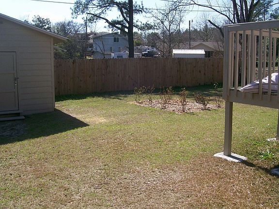 back yard,with flower bed