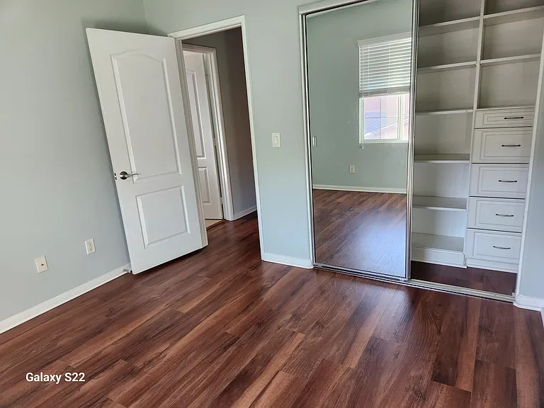 Bedroom #1 (showing custom closet)