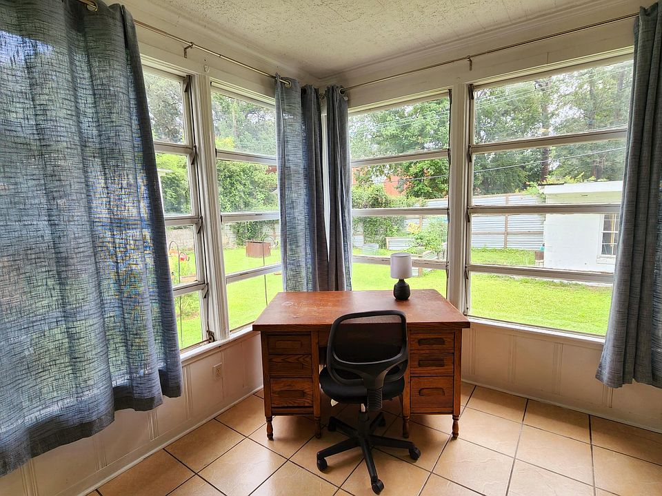 Corner desk with view of backyard
