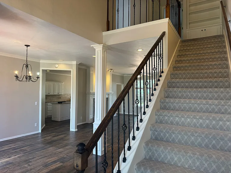 Living room leading in from grand entrance. Updated color shown in pictures.