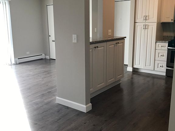 Kitchen: looking from dining room into kitchen and family room