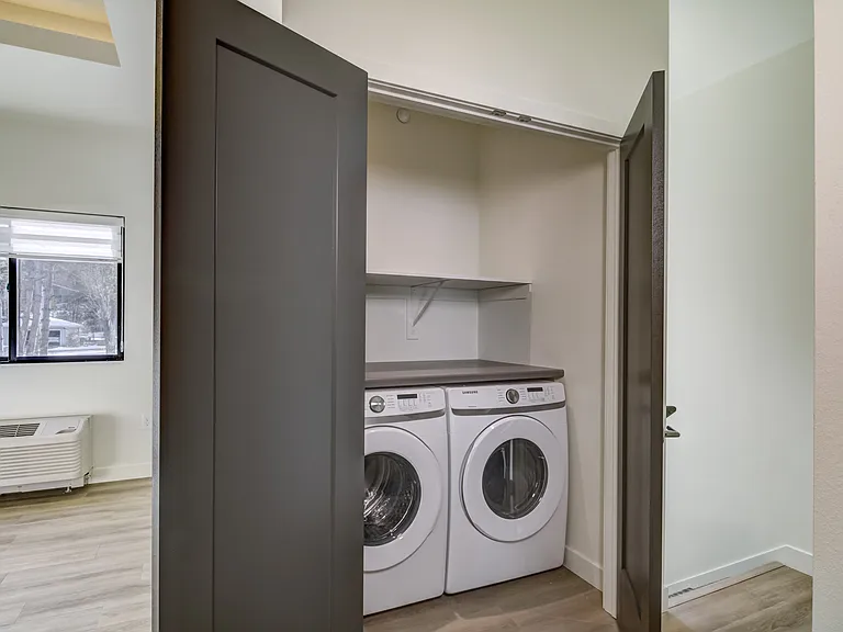 Storage above washer/dryer in one bedroom Breckinridge