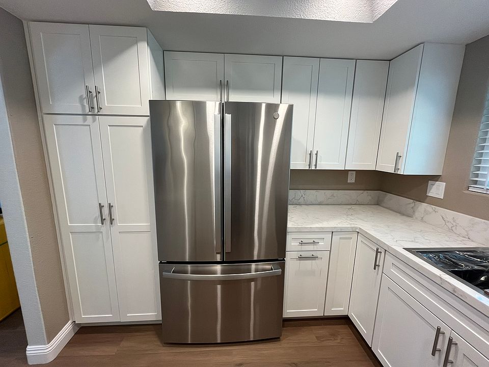 New stainless steel refrigerator included. Floor to ceiling built-in cabinets with large pantry.
