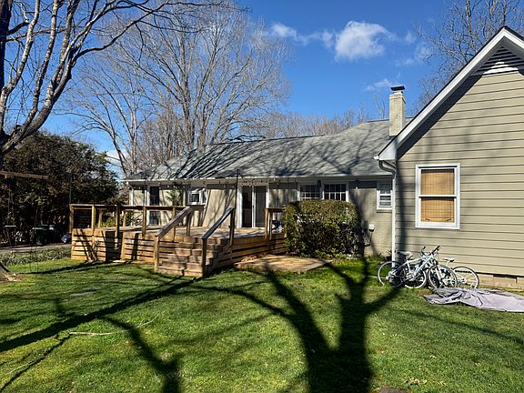 Flat backyard with deck to entertain. Storage under deck.