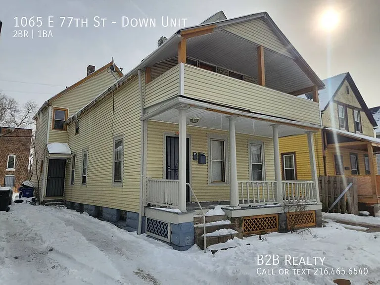 1065 E 77th St #DOWN — Photo 2