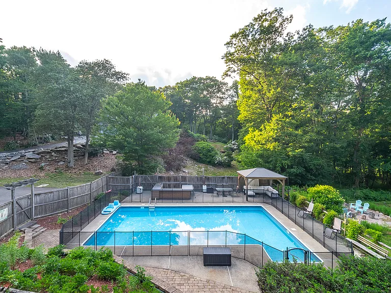 Pool is closed October through May - outdoor sofa will be put away for the winter. Outdoor bar/grill and fire pit will remain open for use.