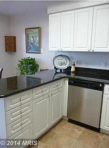 Kitchen island, ceramic tile, stainless appliances