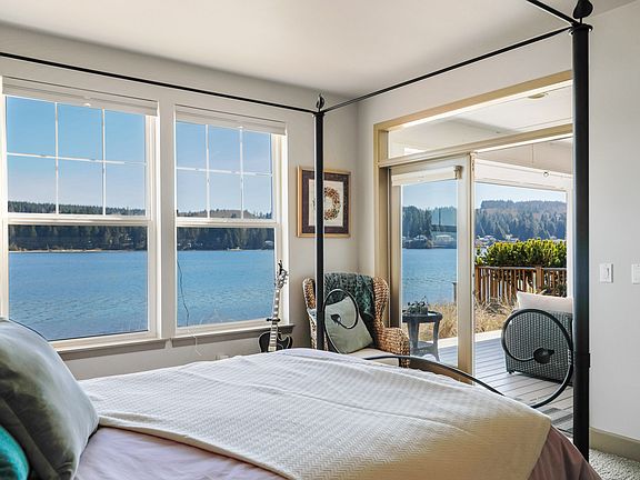 Your suite looks across the inlet at very few lights or homes. The sheltered deck is furnished with blankets and a U-shaped couch and serves as an extended living space.